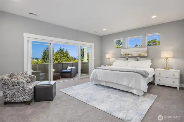 The Primary Suite with covered deck to the left. (Ensuite bath is to the right)