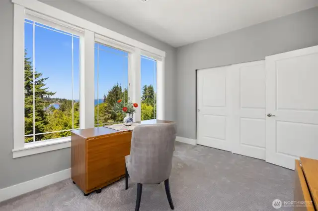 Imagine quilting with a lovely territorial and water view outlook.  See the large closets also.