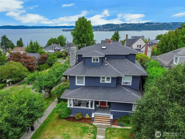 Welcome to this stunning turn-of-the-century multifamily home built in 1906 rich with historic character in desirable Stadium District.