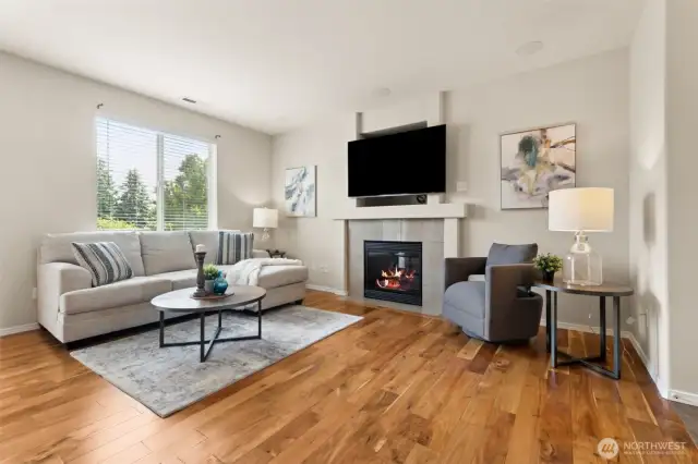 Beautiful floors, new interior paint, gas fireplace . . . plus the mounted TV stays!