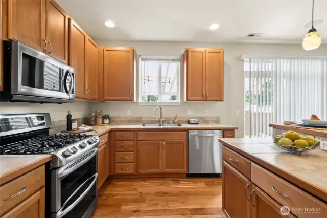 Granite counters, newer appliances (note: double-oven), vinyl windows, good to go for years to come!
