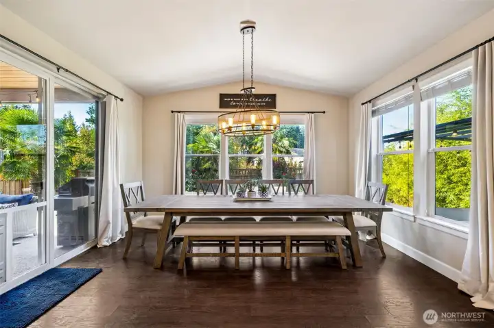 Sunroom with views of the gorgeous landscaped yard