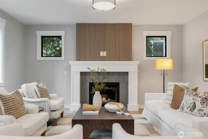 Great room with gas fireplace, smart tubing for a future TV.