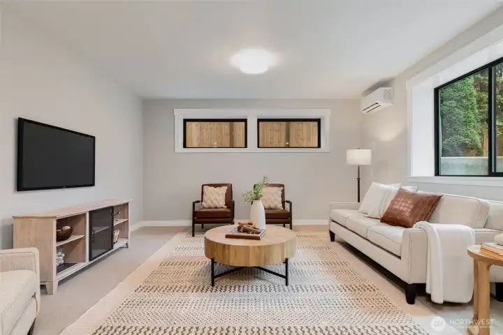 Lower level recreation room. 9 feet ceilings and prewired for surround sound speakers.