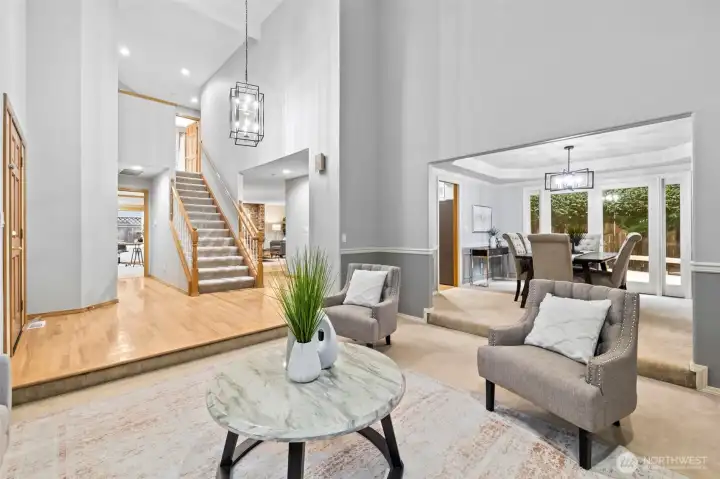 Soaring hardwood entry. Designer paint. Chair rails. New lightings.