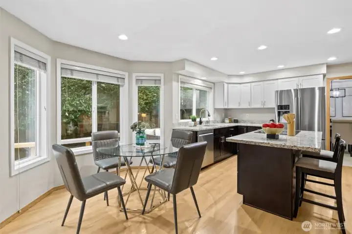 kitchen looks out to tree-lined fence.  Uber private.