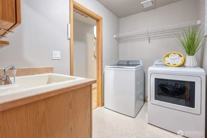laundry room with deep utility sink.