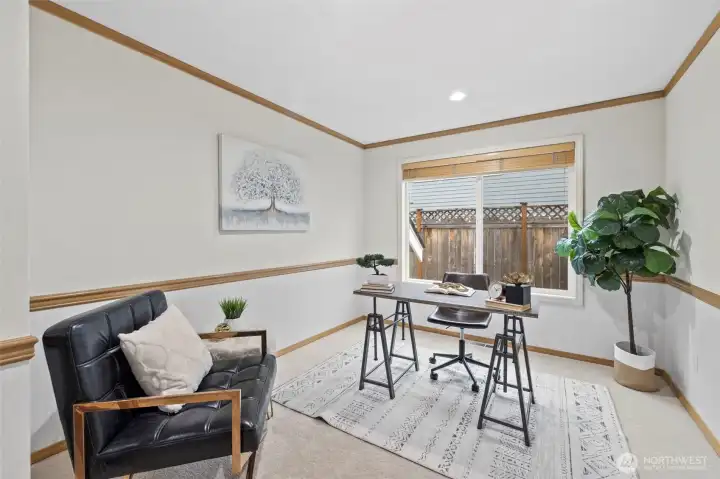 Main floor den or 5th bedroom maybe?  There's a closet in this room as well.