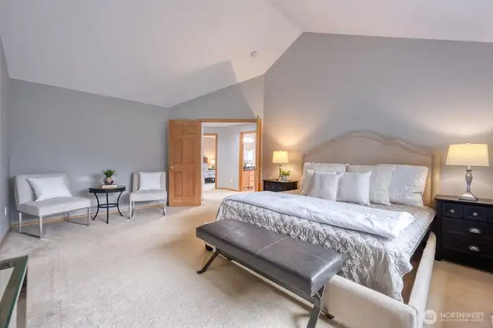 Another angle of the primary suite - plenty of space to relax.