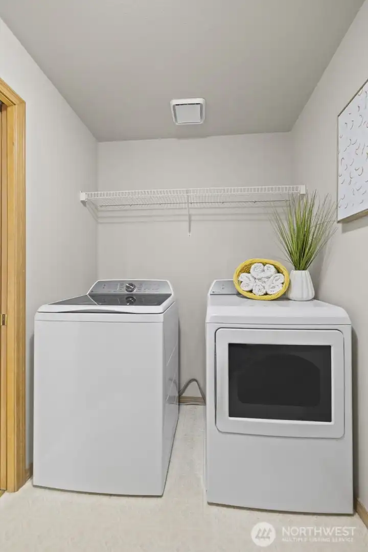 Full size washer and dryer with a deep utility sink(not shown)