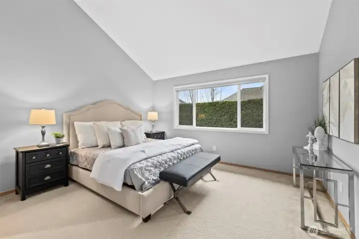 Primary retreat looks out to green trees.