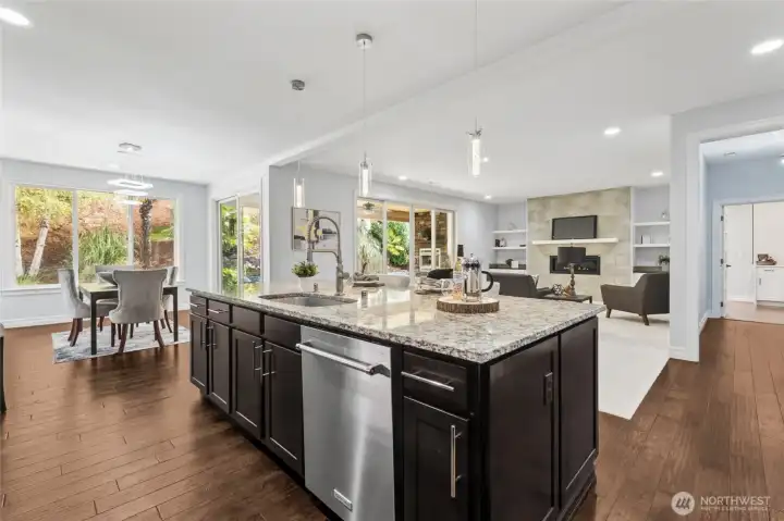Open kitchen layout integrates beautifully with the living and dining spaces for a natural, connected feel.
