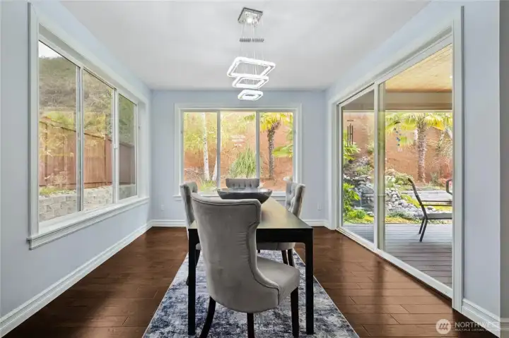 Dining room with a sliding glass door to the covered outdoor living—perfect for any occasion.