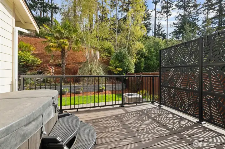 The apartments private deck and hot tub for a true retreat-style living experience.