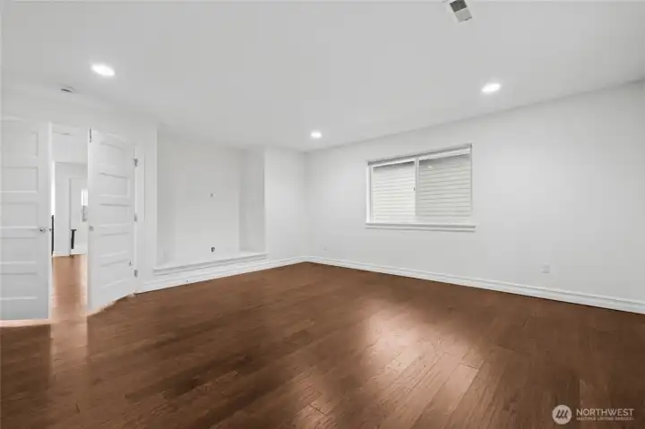 The upstairs bonus room is part of a collection of flexible spaces designed for work, hobbies, or entertainment.