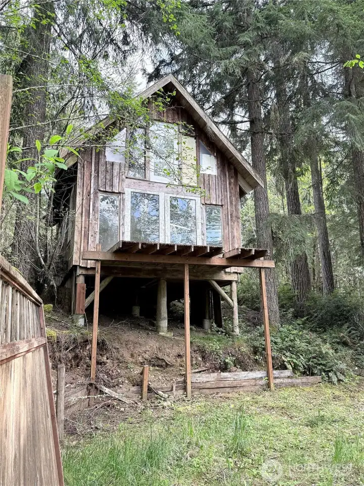 The detached cabin sits up high for stunning views.