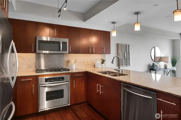 The kitchen is nice and spacious, plus open feeling, making it a pleasure to prepare food and eat at home.  And, it is also ideal for entertaining and socializing.