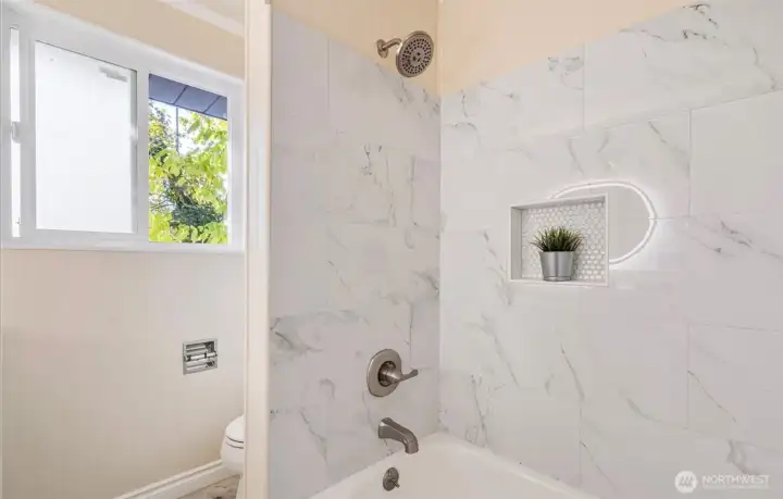 Tiled full bath upstairs