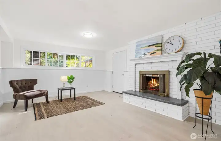 Downstairs MIL living room w gas fireplace