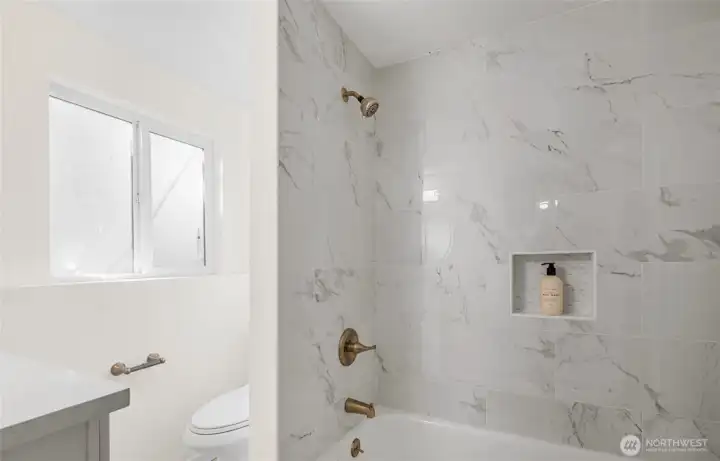 Tiled full bath down