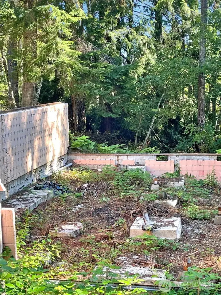 Inside the foundations perimeter with foundation blocks