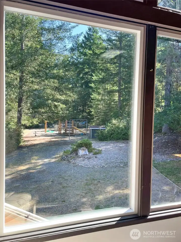 View out to kids play ground from the club house. The community holds 3 big events during the beginning, middle and summer.
