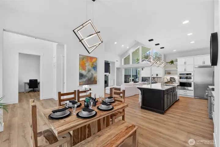 Spacious dining room with designer lighting