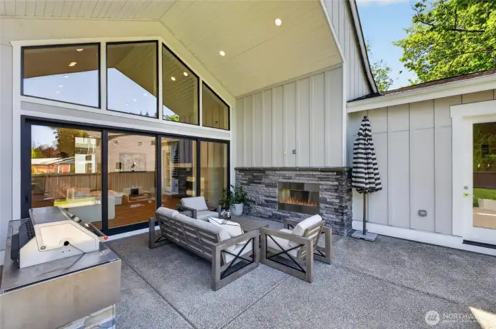 Beautiful covered back patio with fireplace