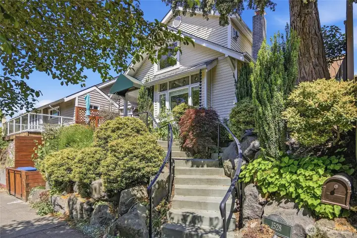 Right at the top of Queen Anne perched above the tree-lined street!