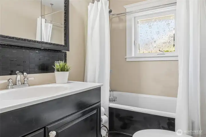 Remodeled main level bathroom with clawfoot tub!