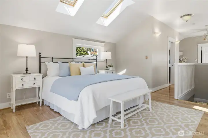 1st door is to beautifully remodeled bath.  The door at very back goes to the other bedroom that was used as the primary.  Lots of options to fit your needs!