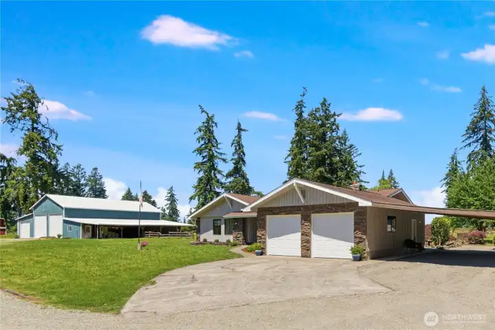 A sprawling rambler with 2,572 sq ft of gracious living invites you to make yourself at home. Not far away is the huge detached shop. A sprawling rambler with 2,572 sq ft of gracious living invites you to make yourself at home. Not far away is the huge detached shop.
