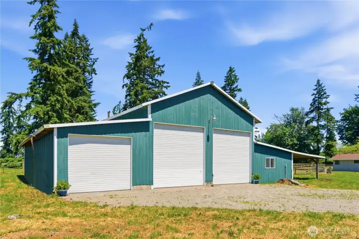 Rare oversized shop features 4,680 sq ft of work space, as well as a generous carport on the side. Rare oversized shop features 4,680 sq ft of work space, as well as a generous carport on the side.