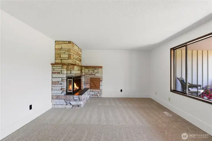 The formal living room features a large picture window. The home features all new interior paint and updated flooring. It's move-in ready! The formal living room features a large picture window. The home features all new interior paint and updated flooring. It's move-in ready!