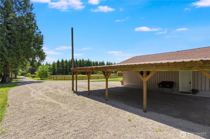 The parking on this property is generous, large enough to accommodate multiple work vehicles, RV parking, or guests' cars. The parking on this property is generous, large enough to accommodate multiple work vehicles, RV parking, or guests' cars.