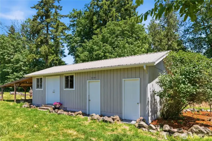 Behind the home you'll find outbuildings that are perfect for garden supplies, farm animal feed, and more. Behind the home you'll find outbuildings that are perfect for garden supplies, farm animal feed, and more.