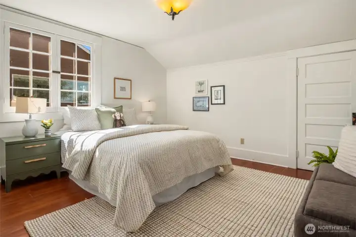The fourth bedroom is located upstairs and also features a large walk-in closet.