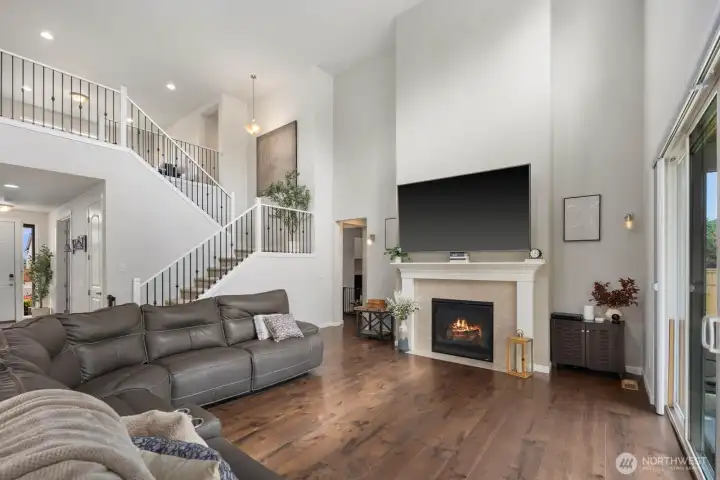 The soaring two-story great room creates a sense of openness that immediately makes an impression.