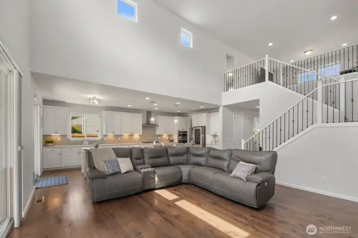 Designed for both everyday living and entertaining, the main living spaces flow together while still feeling distinct.
