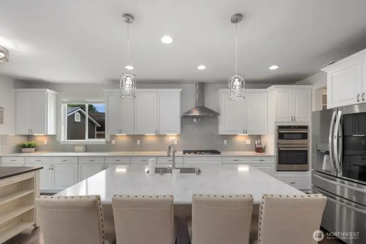 This kitchen doesn't just give you room to cook. It gives you room to spread out, stay organized, and still be part of whatever is happening around you.