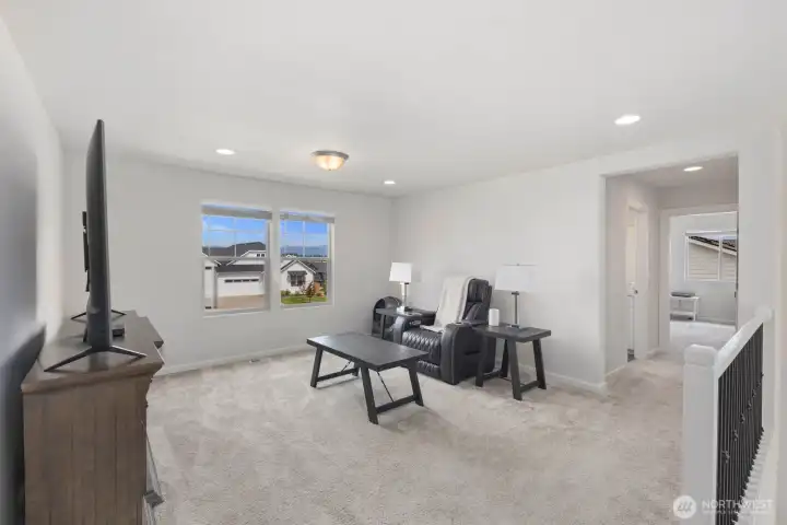 The upstairs loft adds a spacious second living area, creating the flexibility to use the home in a way that works best for you.
