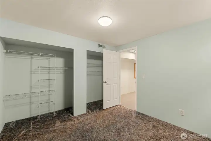 Downstairs bedroom all closets have organizers Downstairs bedroom all closets have organizers