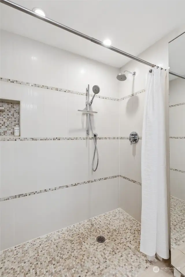 Remodeled walk in shower in primary bath!