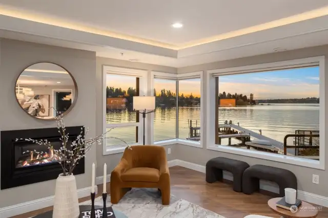 Outstanding lake views anchor the living room as you cozy up to a gas fireplace.