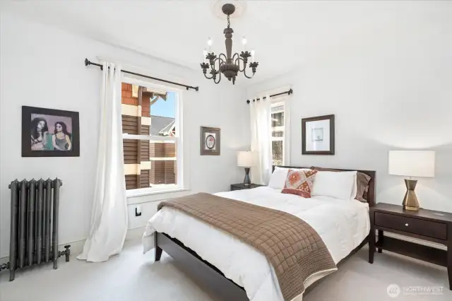 Sizeable bedroom has large closet, two windows and privacy