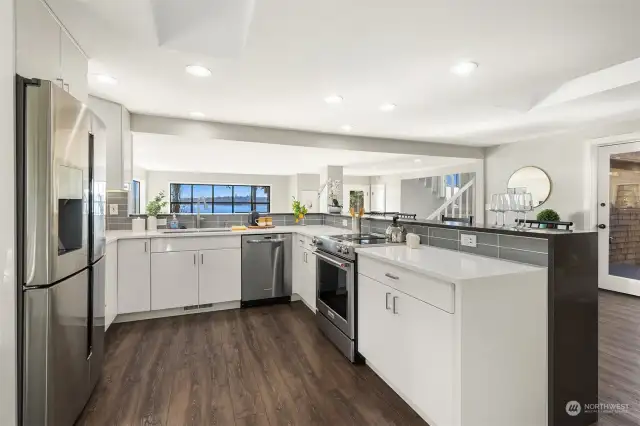 Kitchen with eating bar and views of Lake Washington