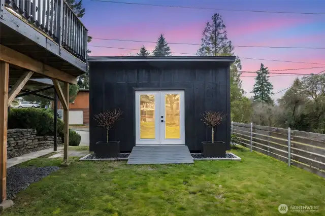 Backyard Multi-use studio- Double wall construction, fully insulated with electrical and heat. Glass French doors and composite decking ramp.