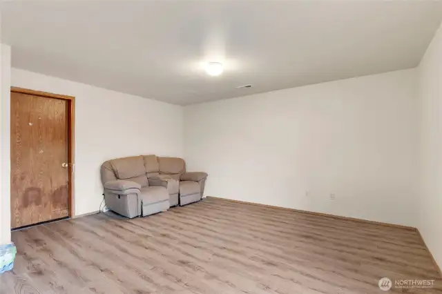Large Family Room and door to the garage.