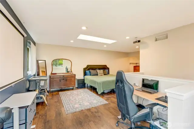 Upstairs primary bedroom with an en-suite