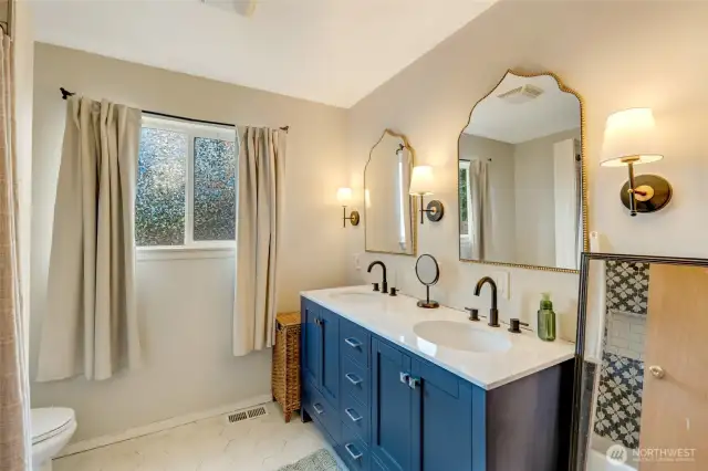 Freshly updated primary bathroom, double sink, large vanity with lots of storage